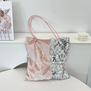 Detail of pink velvet and silver sequin patchwork on a large capacity tote bag