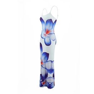 Detailed side view of a white floral maxi dress with blue flowers and slim spaghetti straps
