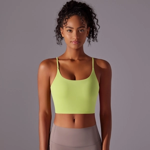 Close-up of neon yellow high-impact sports bra with thin straps and U-neckline detail