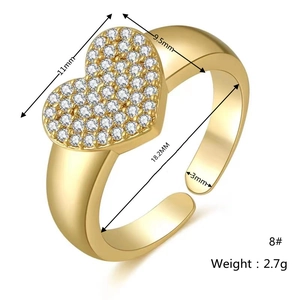 Detail view of gold plated heart ring with inlaid zircons and precise dimensions