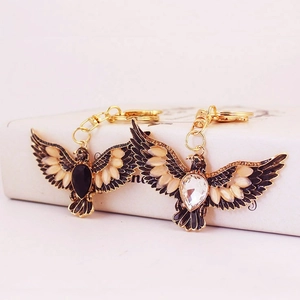 Vintage eagle keychain pendants with glittering rhinestones and colorful crystal gems