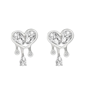 Close-up of heart-shaped silver earrings with sparkling pear-cut cubic zirconia stones