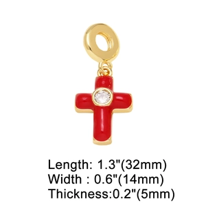 Detail showing red enamel cross pendant with zircon stone and 32mm x 14mm dimensions