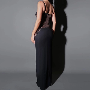 Detail of elegant black lace dress showing slim fit backless design and transparent texture