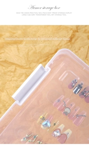 Detail view of transparent nail art storage box with Chrome Hearts style press-on nails