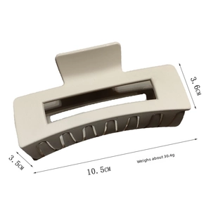 Detailed size chart showing 10.5cm length and 30.4g weight for the cream hair claw clip