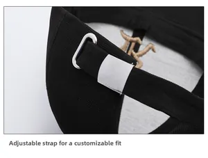 Macro detail of black cotton baseball cap with silver metal buckle and adjustable strap