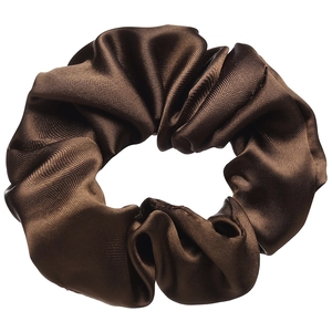 Detailed view of the smooth texture and pleated folds on a dark brown satin scrunchie