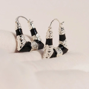 Vintage style geometric trapezoid hoop earrings with black enamel and rippled texture