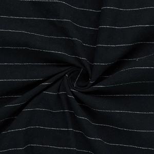 Macro shot of black and white vertical striped linen fabric texture and drape detail