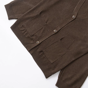 Brown V-neck knit cardigan with button closure and two front pockets on white background