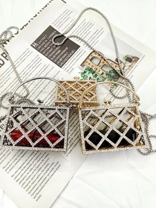 Detailed view of mini rhinestone checkered handbags in gold and silver with metal chain