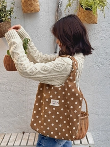 Retro brown polka dot corduroy tote bag with sozakka beaute label shown in lifestyle setting