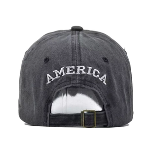 Detailed back view of dark gray washed baseball cap with white AMERICA embroidery