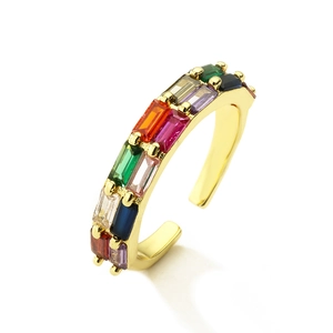 Exquisite gold open ring featuring a vibrant baguette-cut rainbow zircon gemstone setting