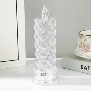 Detailed close-up of diamond-patterned crystal led candle with flame-shaped glowing bulb