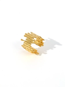 Detail of 18k gold plated stainless steel ring with irregular molten lava design