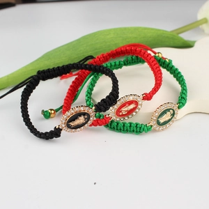Handmade woven Virgin Mary bracelets in red, black and green with crystal religious medal