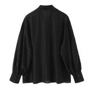 Women's elegant black long sleeve blouse with lantern sleeves and bow tie back detail