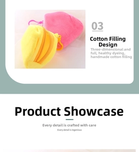 Detail of plush mini coin purses in yellow and pink with soft cotton stuffing