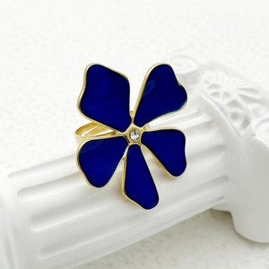 Vintage gold plated stainless steel open ring with blue enamel flower and sparkling crystal