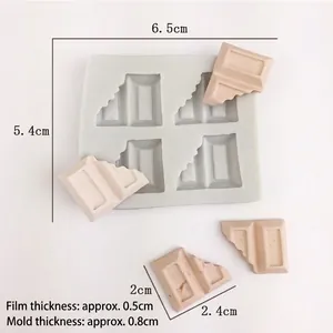 Detailed view of 4-cavity silicone mold for DIY chocolate and waffle shaped crafts