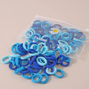 Set blauer hochelastischer Haargummis in einer transparenten „Fashion jewelry“-Tasche.