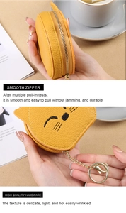 Detail of smooth zipper and high-quality gold hardware on the yellow cat coin purse