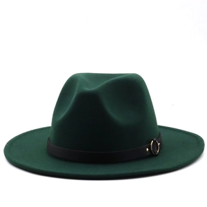 Detail of dark green fedora hat with black leather band and gold metal ring buckle