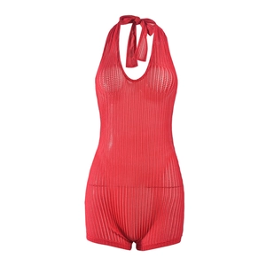 Detail of red crochet knit texture and cutout design on the halter bodysuit