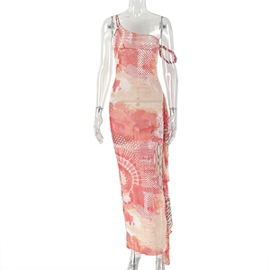 Close-up of pink and orange floral print on a slim fit one-shoulder maxi dress
