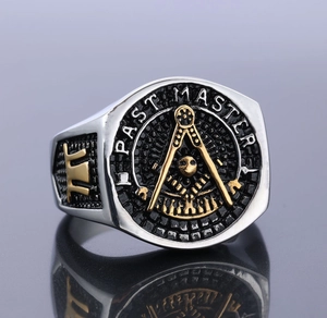 Detail of two-tone stainless steel Past Master ring with Freemason symbol engraving