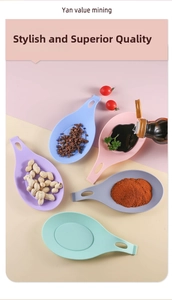 Colorful silicone spoon rests with drip-proof edges and hanging holes for kitchen tools