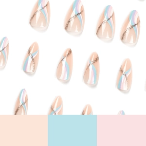 Almond press-on nails with pastel blue and purple wave patterns and golden glitter accents