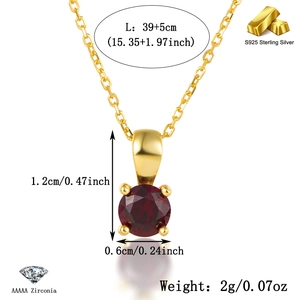 Detail view of gold-plated S925 silver necklace with ruby zircon in 4-prong setting