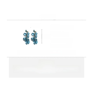 Detailed specs of blue rose petal tassel clip-on earrings in acrylic and alloy