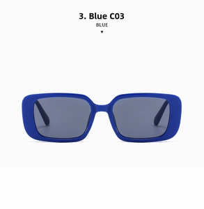 Close-up of blue rectangular frame sunglasses with dark lenses and black temples