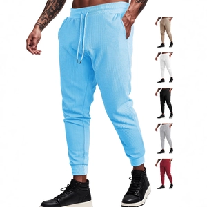 Men's waffle knit jogger pants in light blue with drawstring and elastic cuffs