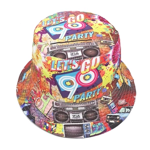 Detail of retro 90s theme prints including cassette tapes on a polyester bucket hat