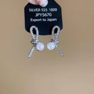 Elegant S925 silver knot earrings with zircon crystals and round pearls for women