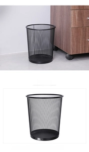 Detail view of black metal mesh wastebasket with solid base and smooth top rim
