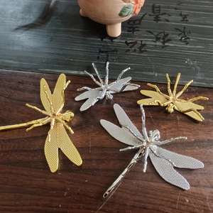 Golden and silver metal dragonfly figurines with detailed wings for Kung Fu tea ceremony