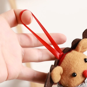Felt reindeer Christmas tree ornament with red ribbon hanger and detailed stitching