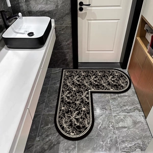 U-shaped heart bath mat with floral patterns on black background for bathroom safety