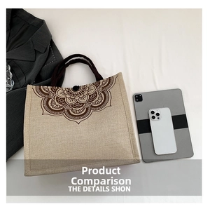Linen tote bag with bohemian pattern showing storage capacity for tablet and phone