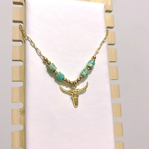Bohemian bull head pendant necklace in gold stainless steel with turquoise stone accents