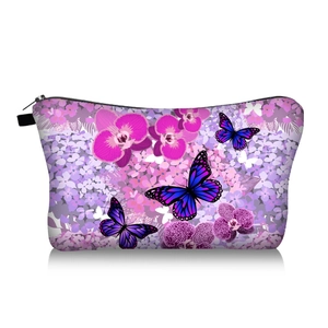 Close-up of floral butterfly print makeup bag with durable black zipper closure