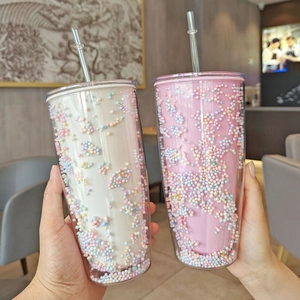 Dual-layer high capacity straw tumblers with colorful foam balls in white and pink