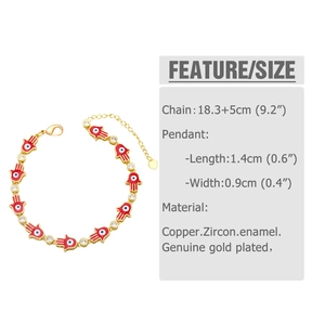 Detail of bohemian red enamel Hamsa Hand bracelet with gold plating and zircons