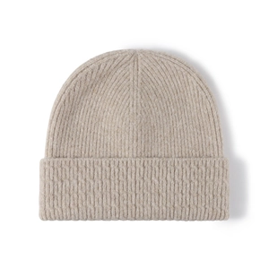 Minimalist beige knitted beanie with vertical ribbed texture and wide fold-over cuff